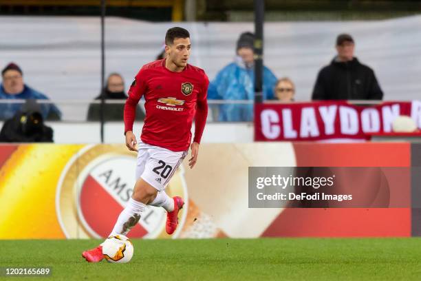 Diogo Dalot of Manchester United controls the ball during the UEFA Europa League round of 32 first leg match between Club Brugge and Manchester...