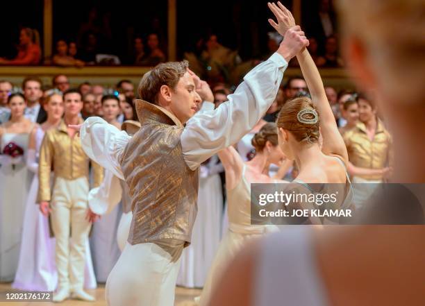 Dancers of State Opera Ballet perform during the opening ceremony at the Vienna State Opera during the annual Opera Ball in Vienna, Austria on...