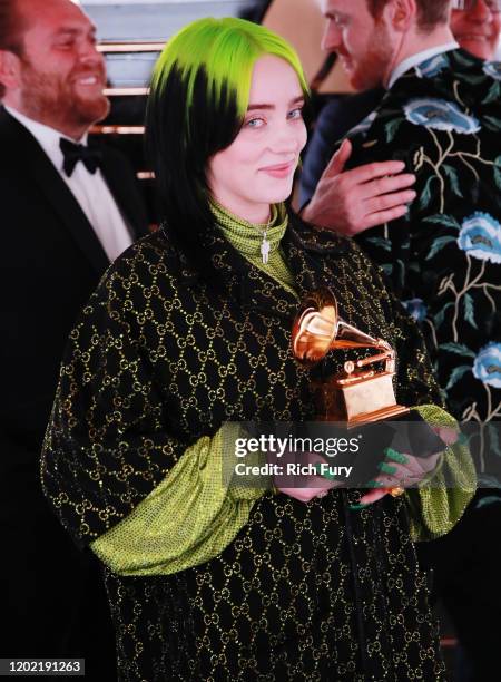 Record of the Year award winner Billie Eilish celebrates during the 62nd Annual GRAMMY Awards at STAPLES Center on January 26, 2020 in Los Angeles,...