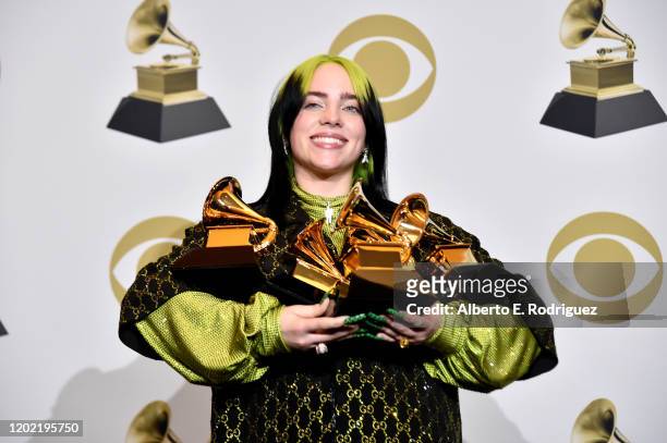 Billie Eilish poses with her awards in the press room during the 62nd Annual GRAMMY Awards at STAPLES Center on January 26, 2020 in Los Angeles,...
