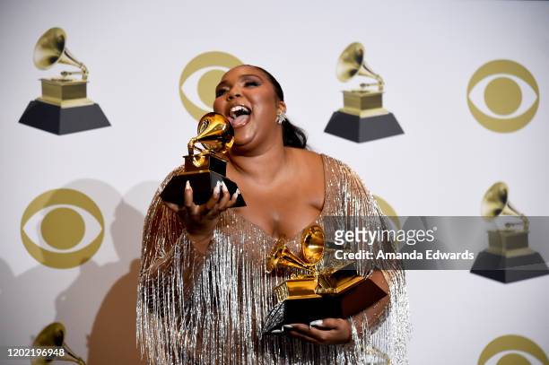 Lizzo, winner of Best Pop Solo Performance, Best Traditional R&B Performance and Best Urban Contemporary Album, poses in the press room during the...