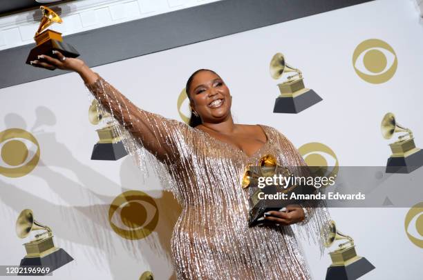 Lizzo, winner of Best Pop Solo Performance, Best Traditional R&B Performance and Best Urban Contemporary Album, poses in the press room during the...