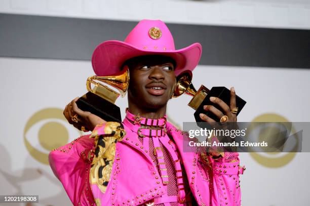 Lil Nas X, winner of Best Music Video and Best Pop Duo/Group Performance for "Old Town Road " and Album of the Year for his EP, 7 poses in the press...