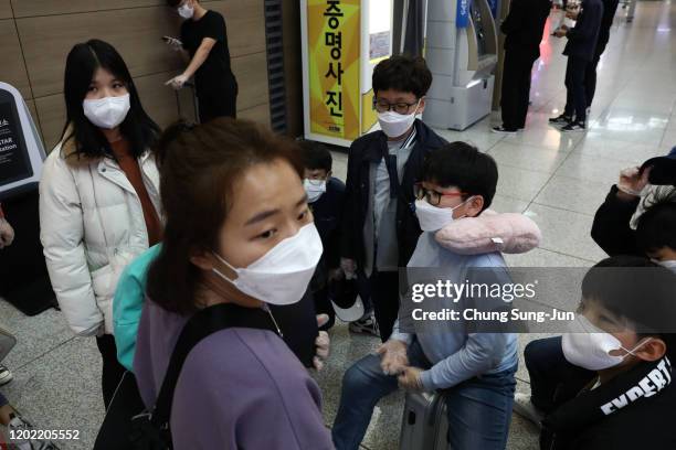 South Korean teenagers wearing masks at the Incheon International Airport on January 27, 2020 in Incheon, South Korea. South Korea confirmed its...