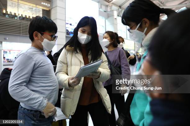 South Korean teenagers wearing masks at the Incheon International Airport on January 27, 2020 in Incheon, South Korea. South Korea confirmed its...