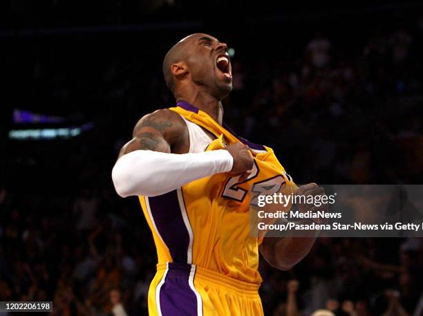 Laker's Kobe Bryant celebrates a three pointer in the fourth quarter as the Lakers beat the Nuggets 122-107 during a first round playoff basketball...