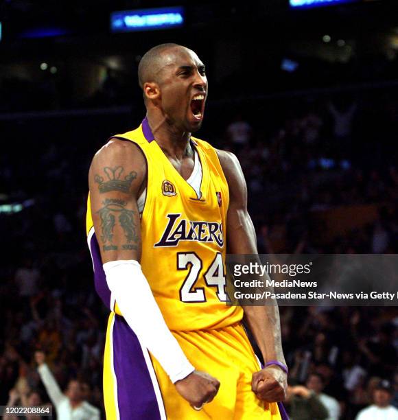 Laker's Kobe Bryant celebrates a three pointer in the fourth quarter as the Lakers beat the Nuggets 122-107 during a first round playoff basketball...
