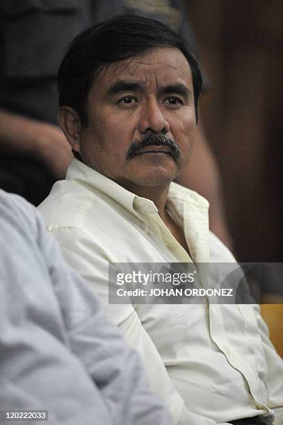 Reyes Collin Gualip, one of four military men accused of the murder of 252 farmers in 1982, during their trial, in Guatemala City, on August 1, 2011....