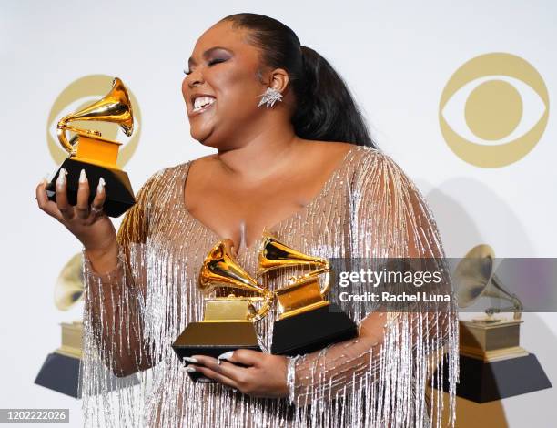 Lizzo, winner of Best Pop Solo Performance, Best Traditional R&B Performance and Best Urban Contemporary Album, poses in the press room during the...