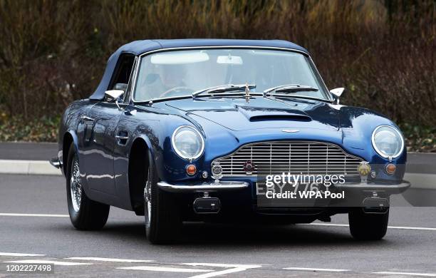 Prince Charles, Prince of Wales drives his Aston Martin DB6 as he arrives at the new Aston Martin Lagonda factory on February 21, 2020 in Barry,...