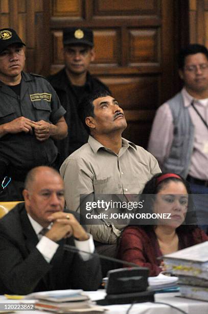 Manuel Pop Sun , one of four military men accused of the murder of 252 farmers in 1982, during their trial, in Guatemala City, on August 1, 2011. The...