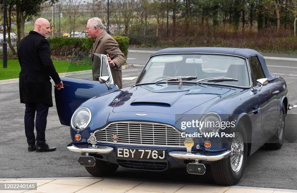 Prince Charles, Prince of Wales leaves his Aston Martin DB6 during his visit to the new Aston Martin Lagonda factory on February 21, 2020 in Barry,...