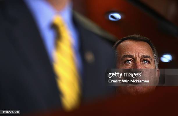 Speaker of the House John Boehner listens to a question during a news conference on the debt limit impasse at the U.S. Capitol on August 1, 2011 in...