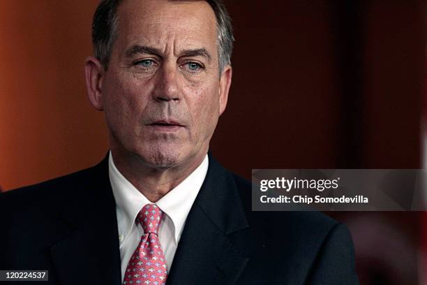Speaker of the House John Boehner speaks, saying he has encouraged Republican members to support a bipartisan debt ceiling deal, during a news...