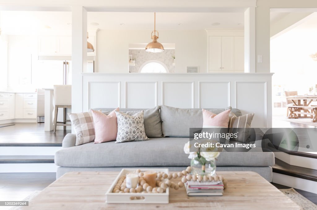 Interior white sitting room and kitchen