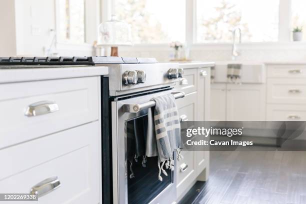 kitchen close up of stove - dish towel stock pictures, royalty-free photos & images