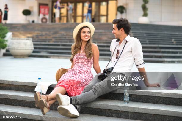 young tourist couple having fun in the city - novi sad stock pictures, royalty-free photos & images