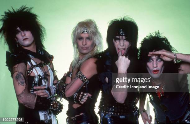 Bassist Nikki Sixx, lead singer Vince Neil, lead guitarist Mick Mars and drummer Tommy Lee of the American hard rock band Motley Crue pose for a...