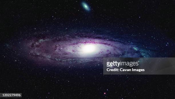 andromeda galaxy and surrounding stars - spiral galaxy stock pictures, royalty-free photos & images