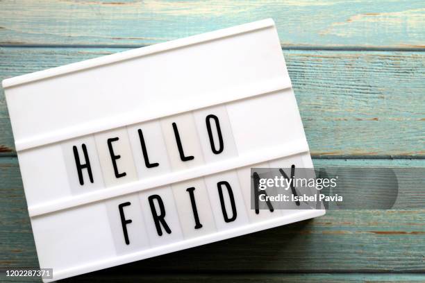 "hello friday" message in light box - friday stock pictures, royalty-free photos & images