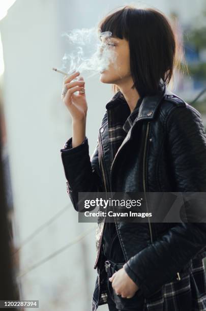 Female Puff Puff Cigarette Photos and Premium High Res Pictures - Getty Images