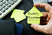 Renters insurance sign on the house shaped sheet.