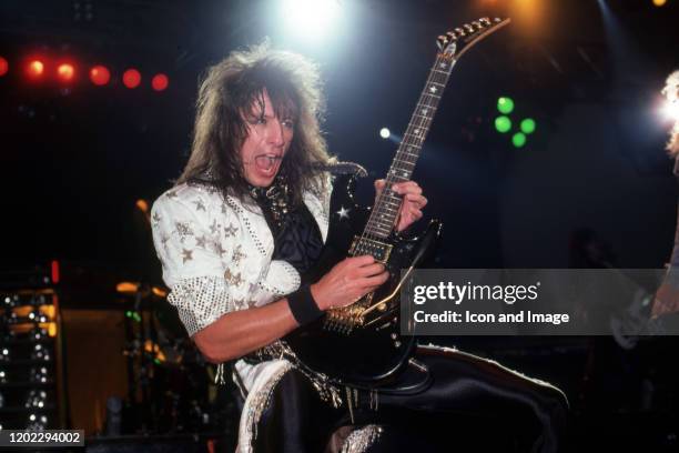 Richie Sambora, lead guitarist for the American hard rock band Bon Jovi, onstage at the Joe Louis Arena, during their Slippery When Wet tour, in...