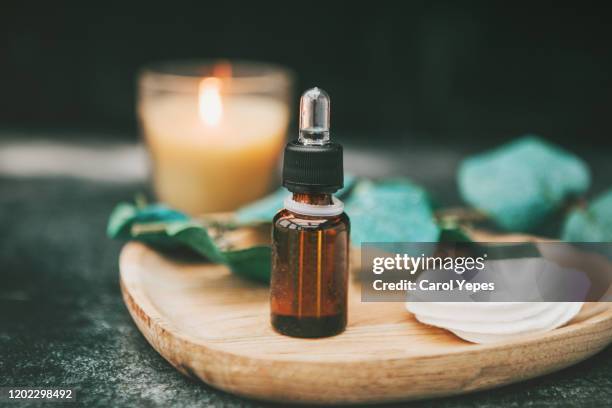 essential oils and medical flowers herbs - aromatherapy oil stock pictures, royalty-free photos & images