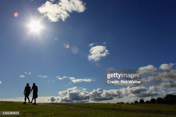 Corey Flynn and Ali Williams of the All Blacks leave the field following a New Zealand All Blacks training session at Trusts Stadium on August 2,...