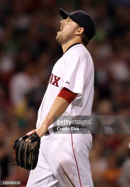 John Lackey of the Boston Red Sox reacts after giving up a two run homer in the sixth inning to Asdrubal Cabrera of the Cleveland Indians on August...