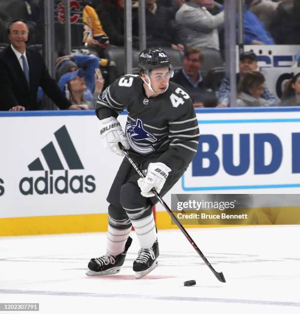 Quinn Hughes of the Vancouver Canucks skates in the game between Atlantic Division v Pacific Division during the 2020 Honda NHL All-Star Game at...