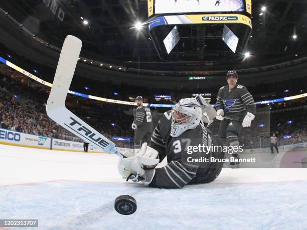 Connor Hellebuyck of the Winnipeg Jets watches Atlantic Division All-Stars puck get past him in the game between Pacific Division and Central...