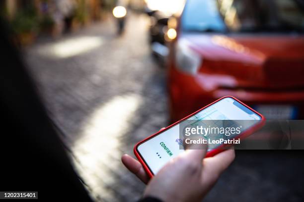 waiting for a ride in central rome - carpool stock pictures, royalty-free photos & images
