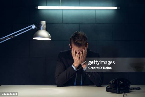 arrested businessman - kidnapping stock pictures, royalty-free photos & images
