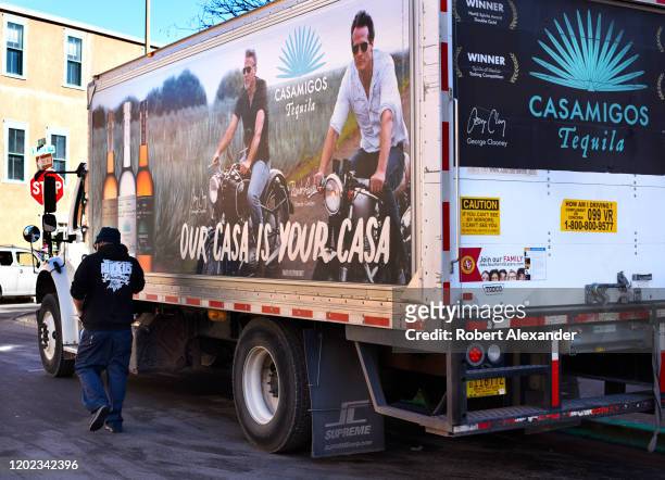 Truck and driver delivers Casamigos tequila in Santa Fe, New Mexico. Casamigos is a tequila company founded in 2013 by George Clooney, Rande Gerber...