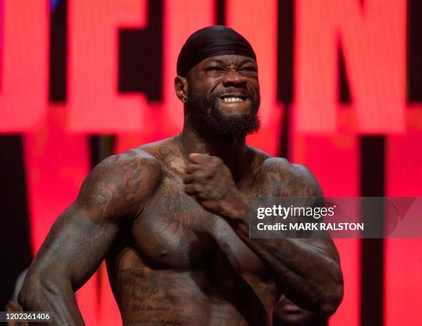 Boxer Deontay Wilder reacts during his official weigh-in before his heavyweight boxing fight against British boxer Tyson Fury at the MGM Grand Las...