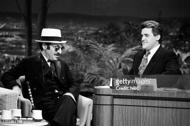 Pictured: Musical guest Leon Redbone during an interview with guest host Jay Leno on June 22, 1990 --