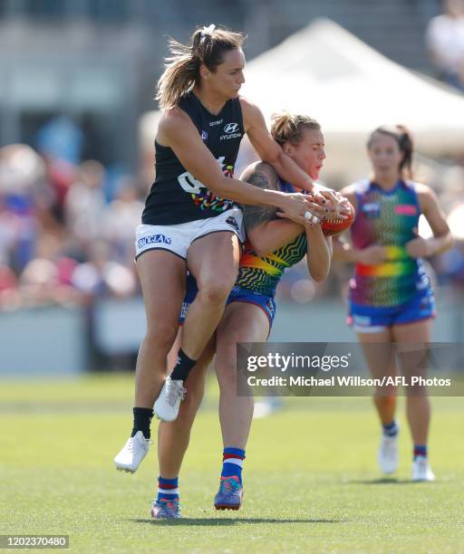 Hannah Scott of the Bulldogs and Nicola Stevens of the Blues collide during the 2020 AFLW Round 03 match between the Western Bulldogs and the Carlton...