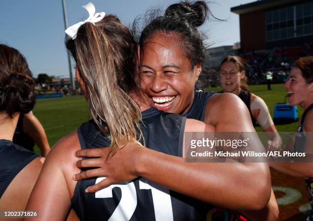 Nicola Stevens and Mua Laloifi of the Blues celebrate during the 2020 AFLW Round 03 match between the Western Bulldogs and the Carlton Blues at VU...