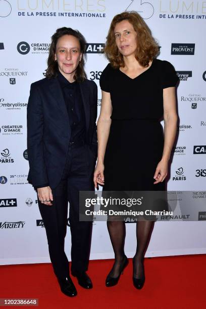 Celine Sciamma and Claire Mathon attends the 25th "Lumieres De La Presse Internationale" Ceremony on January 27, 2020 in Paris, France.