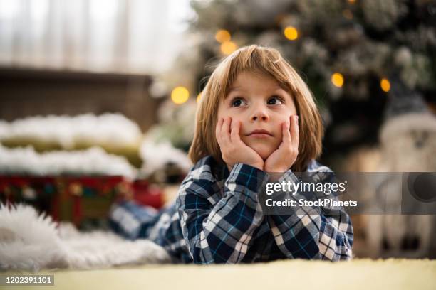 little boy at christmas - child waiting stock pictures, royalty-free photos & images