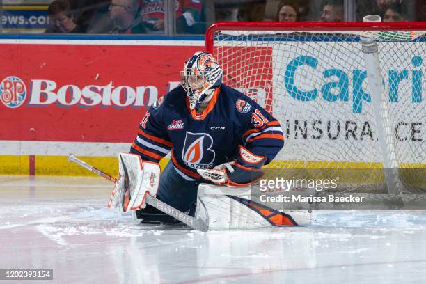 Dylan Garand of the Kamloops Blazers stretches in net at the start of second period against the Kelowna Rockets at Prospera Place on January 11, 2020...