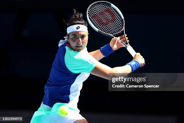 Ons Jabeur of Tunisia plays a backhand during her Women's Singles Quarterfinal match against Sofia Kenin of the United States on day nine of the 2020...