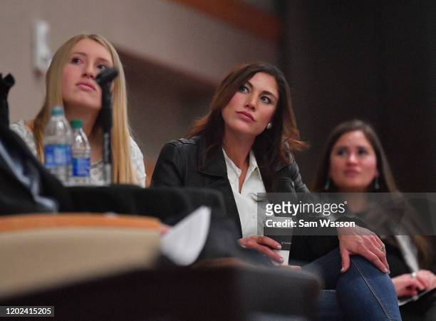 Soccer player Hope Solo watches a short video recap of the 2011 FIFA Women's World Cup quarterfinal match between USA and Brazil during 'Champion &...