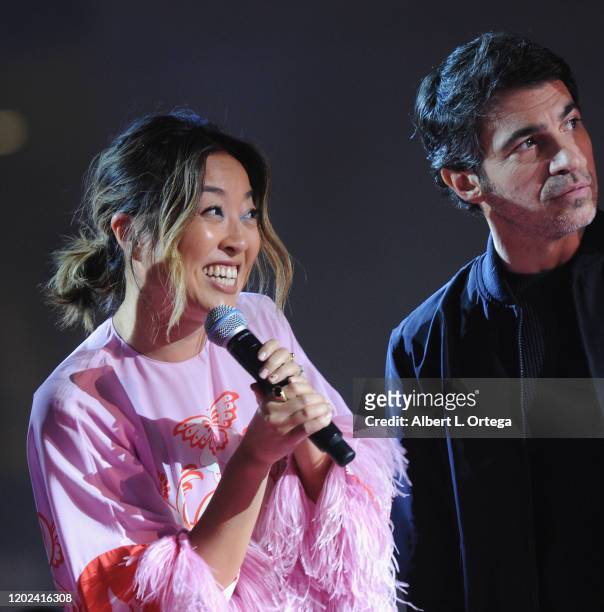 Cathy Yan and Chris Messina attend A Night of Music and Mayhem in "Harleywood," hosted by the cast of "Bird Of Prey " held at Hollywood and Highland...