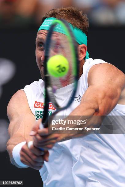 Tennys Sandgren of the United States plays a forehand during his Men’s Singles Quarterfinal match against Roger Federer of Switzerland on day nine of...