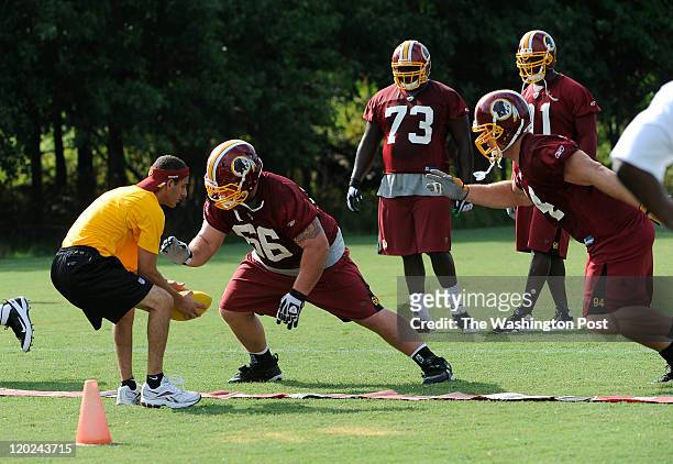 Redskins defense Chris Neild and Adam Cariker during second day of Redskins Training Camp on July 30, 2011.