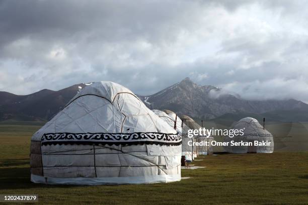 traditional kyrgyz tents yurt. song kol lake, kyrgyzstan. - kyrgyzstan stock pictures, royalty-free photos & images