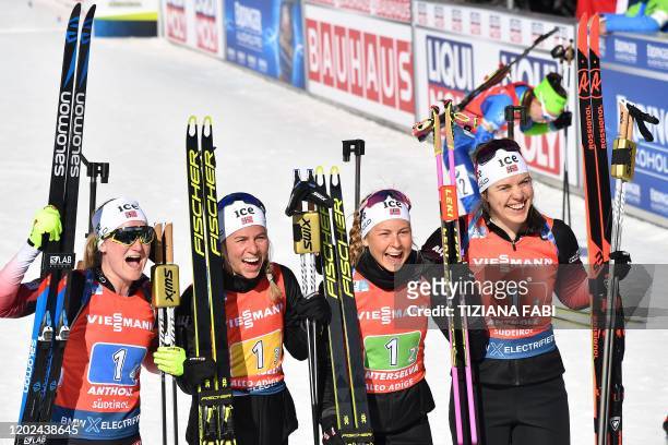 Norwegian Marte Olsbu Roiseland, Norwegian Tiril Eckhoff, Norwegian Ingrid Landmark Tandrevold and Norwegian Synnove Solemdal celebrate after winning...