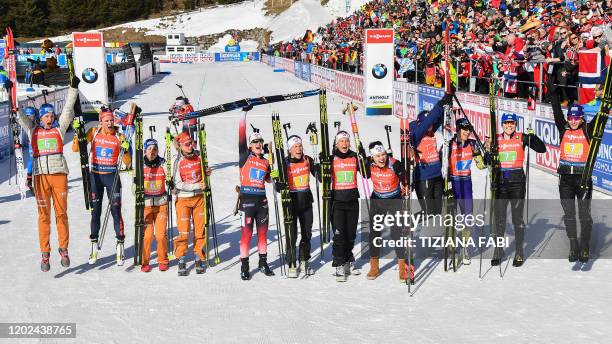 Second-placed Germany's Vanessa Hinz, Denise Herrmann, Franziska Preuss and Karolin Horchler, winners Norway's Marte Olsbu Roiseland, Tiril Eckhoff,...